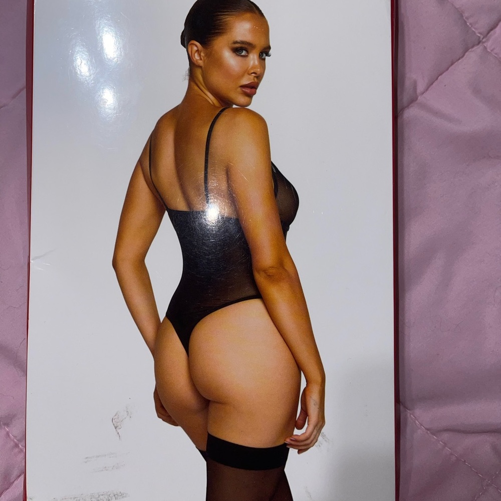 Sexy black matte netted bodysuit with garters